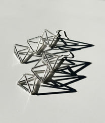 INTERLOCK GLASS Transparent Earrings