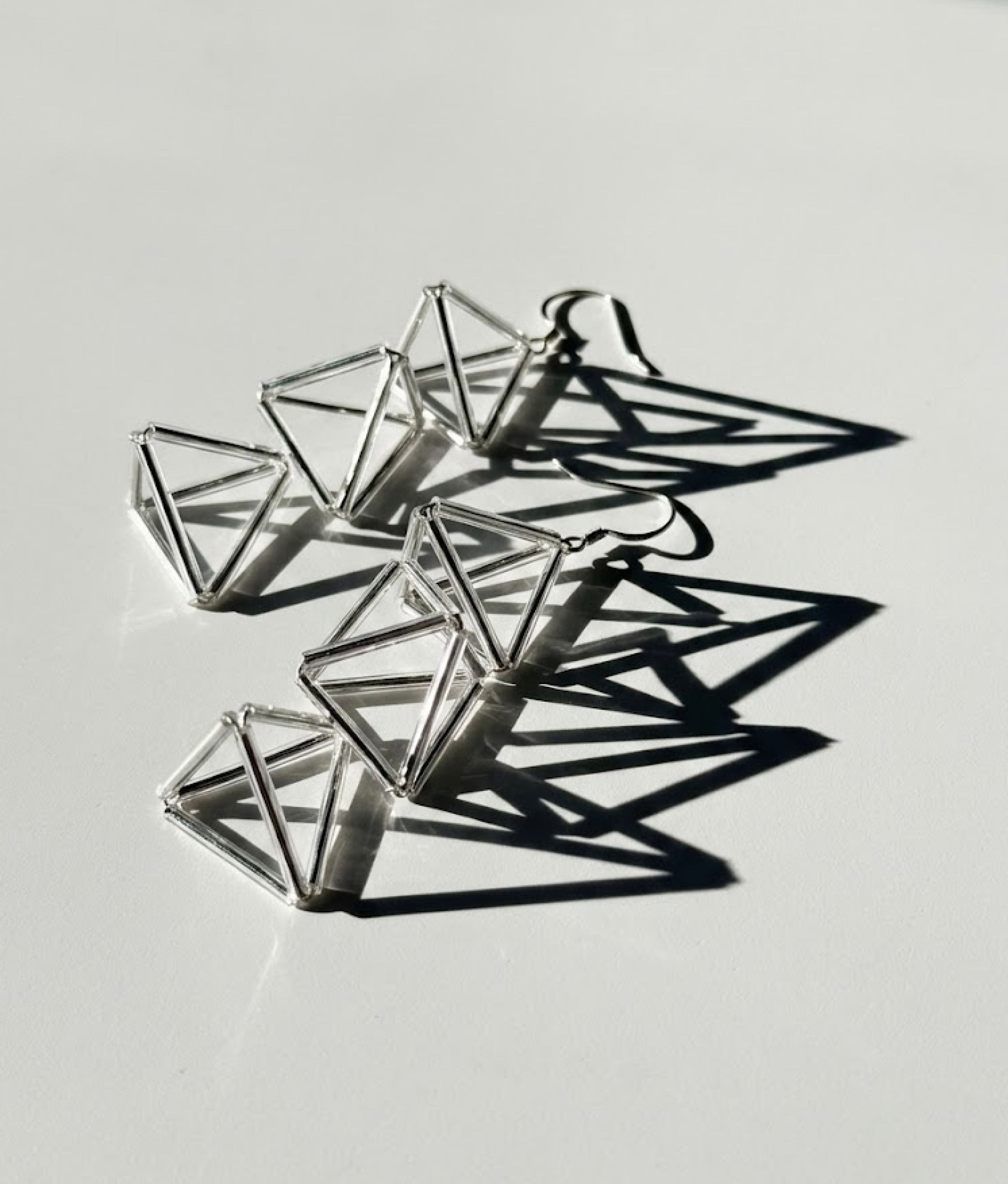 INTERLOCK GLASS Transparent Earrings